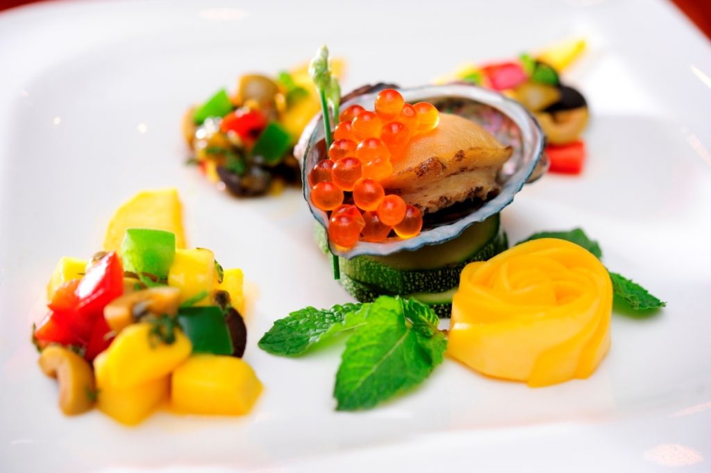 Steamed greenlip abalone with mango salsa and salmon eggs
