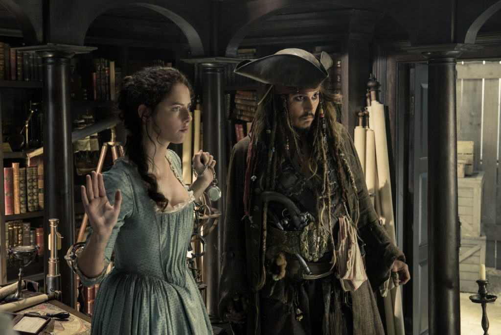 "PIRATES OF THE CARIBBEAN: DEAD MEN TELL NO TALES"..The villainous Captain Salazar (Javier Bardem) pursues Jack Sparrow (Johnny Depp) as he searches for the trident used by Poseidon..Pictured L-R: Kaya Scodelario (Carina Smyth) and Johnny Depp (Captain Jack Sparrow)..Ph: Peter Mountain..© Disney Enterprises, Inc. All Rights Reserved.